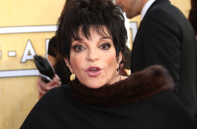 LOS ANGELES, CA - JANUARY 18: Liza Minnelli arrives at the 20th Annual Screen Actors Guild Awards at the Shrine Auditorium on January 18, 2014 in Los Angeles, California. (Photo by Dan MacMedan/WireImage)